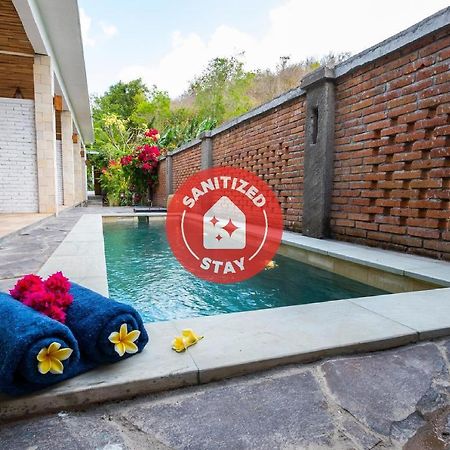 Oyo 1493 Surya Villa Selong Belanak Extérieur photo